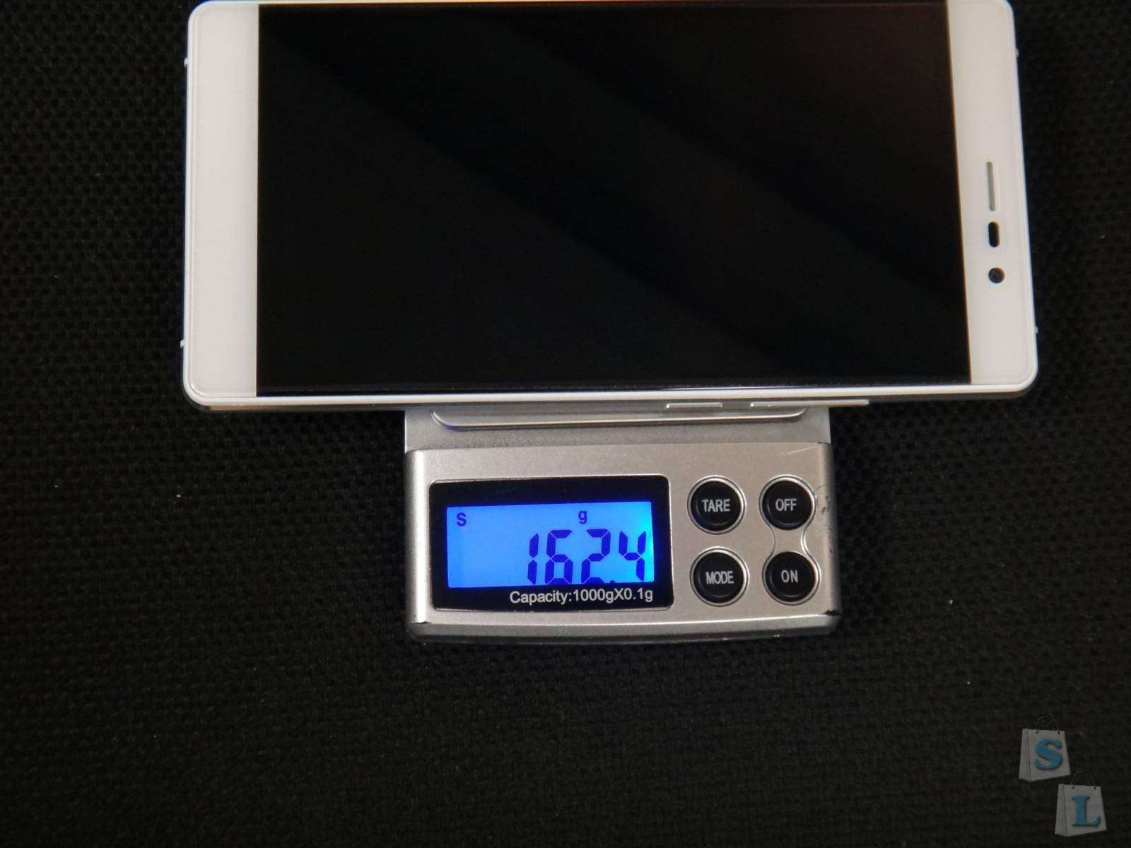 CooliCool: UMI FAIR MHAUMFR красивый бюджетник со сканером отпечатка пальца